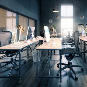 Modern office with desks and computers.